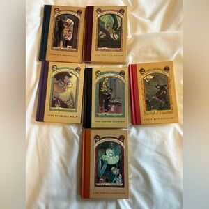 Books 1,2,4,5,6,8: A Series of Unfortunate Events